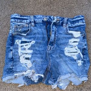 blue jean shorts with rips